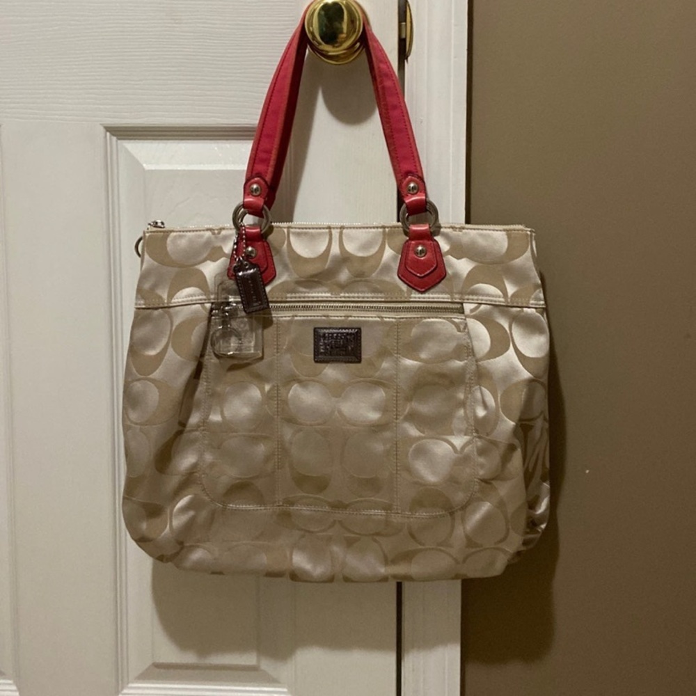 Authentic Coach purse with pink handles